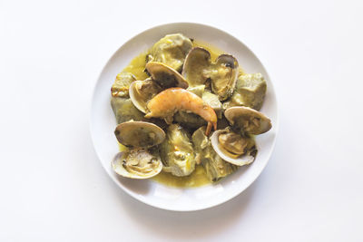 High angle view of food in bowl on white background