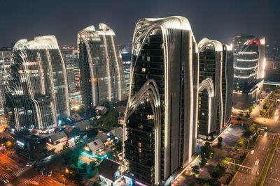 High angle view of city buildings at night