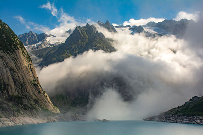 Mountains around the gelmer lake on a cloudy day.