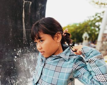 Portrait of a girl looking away