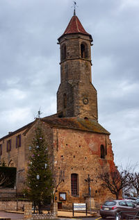 Low angle view of old building against sky