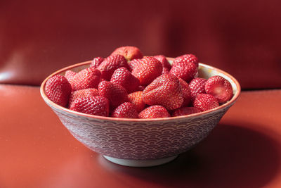 Close-up of raspberries in bowl on table