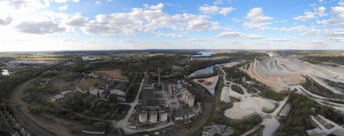 High angle view of city buildings against sky