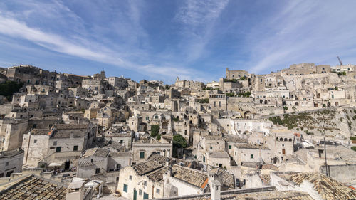 Aerial view of townscape against sky