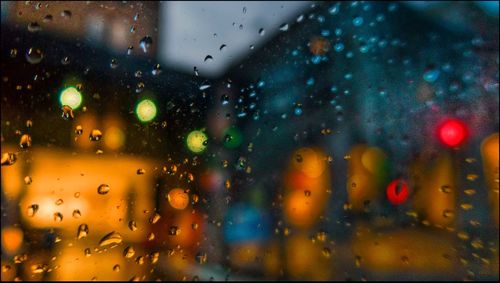 Close-up of wet window in rainy season