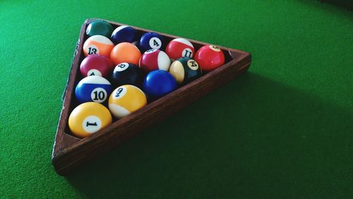 Close-up of multi colored balls on table