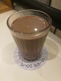 High angle view of coffee cup on table