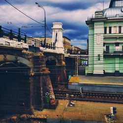 View of buildings against cloudy sky