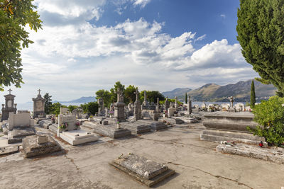 Panoramic view of cemetery against sky