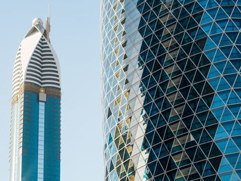 Low angle view of modern building against clear sky