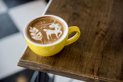 Close-up of cappuccino on table