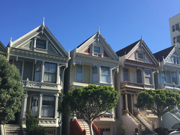 Low angle view of building against blue sky