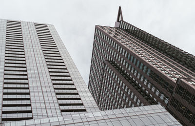 Low angle view of modern buildings against sky