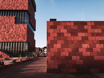 Brick wall against clear sky