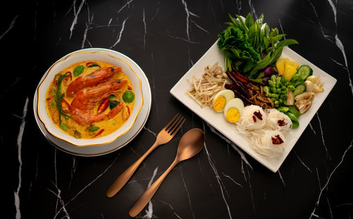 High angle view of meal served on table