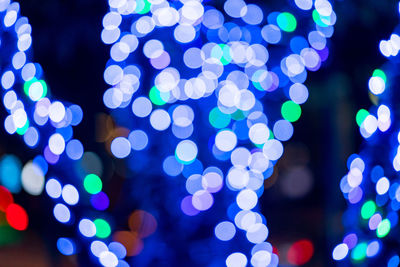 Defocused image of illuminated christmas lights