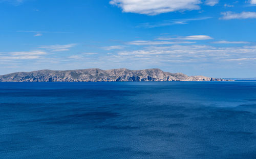 Blue seascape, island, background, nature, horizon.