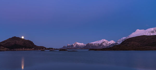 Full moon over fredwang in lofoten