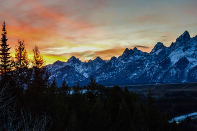 Scenic view of mountains against sky during sunset