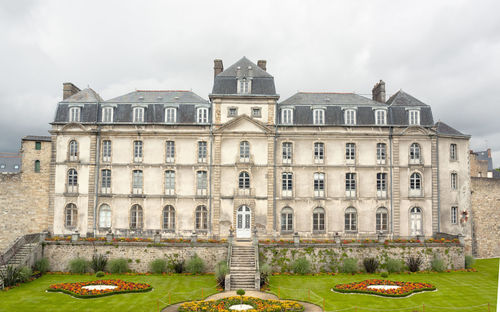 Old building against cloudy sky