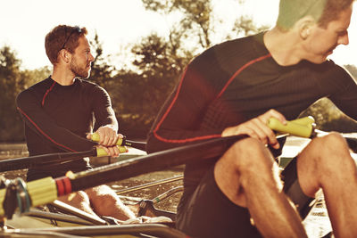 Young men canoeing