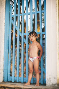 Boy standing outdoors