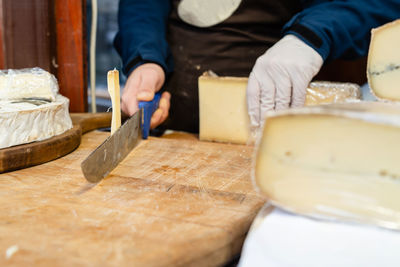 Midsection of man preparing food