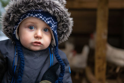 Portrait of cute baby boy in winter