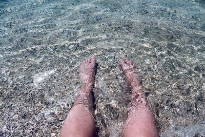 Low section of person on beach