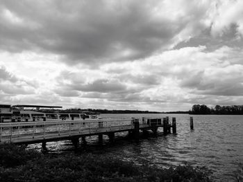 View of calm sea against cloudy sky