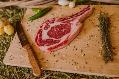 Close-up of meat on cutting board