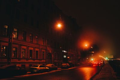 Cars moving on road at night