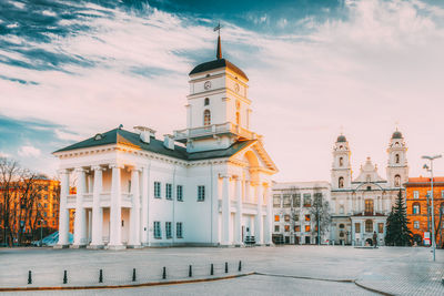 Buildings in city against sky