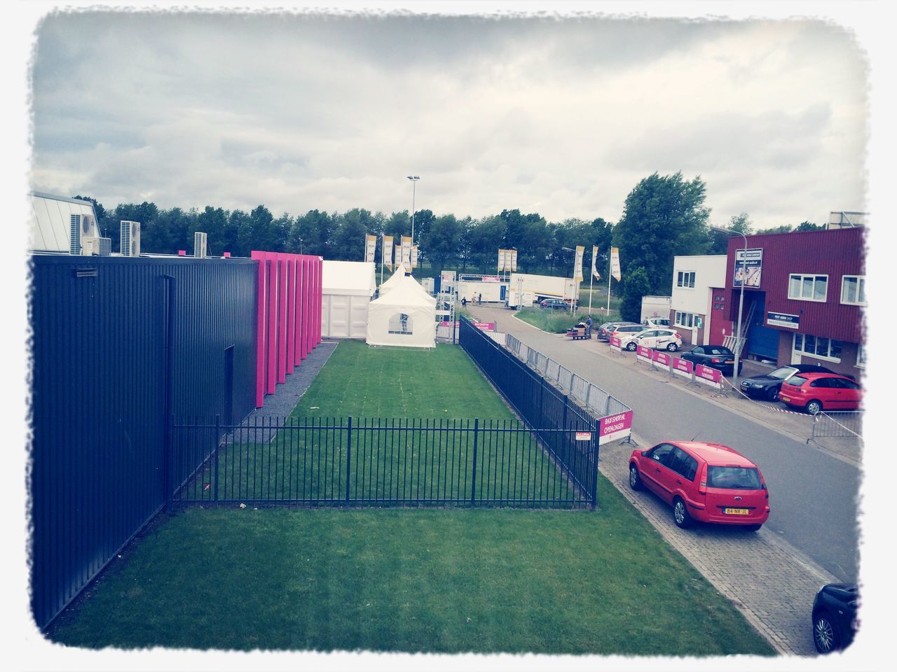 transfer print, building exterior, auto post production filter, architecture, built structure, sky, transportation, cloud - sky, mode of transport, cloudy, day, cloud, car, outdoors, grass, land vehicle, road, overcast, no people, house