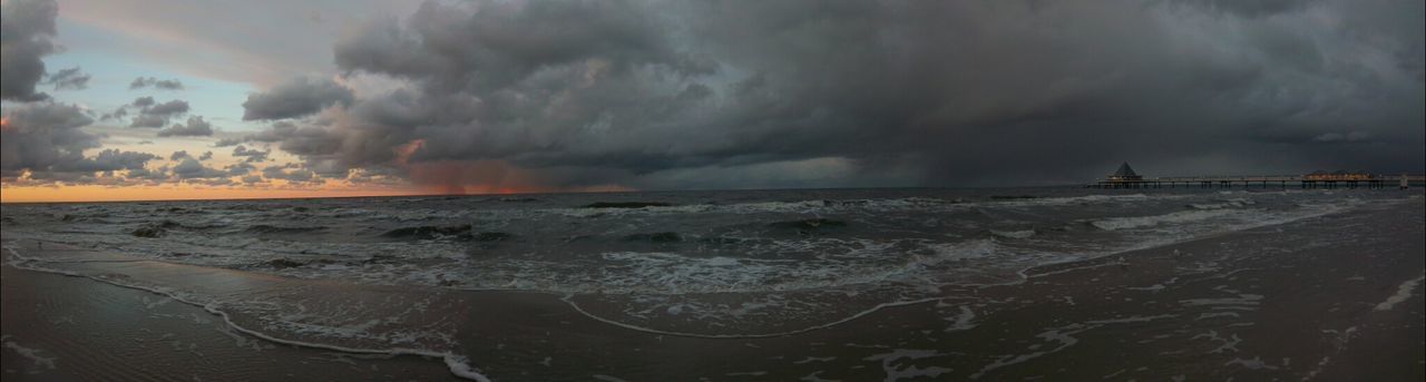 sky, cloud - sky, sea, weather, water, cloudy, scenics, sunset, beach, beauty in nature, tranquil scene, tranquility, horizon over water, nature, overcast, transportation, shore, dusk, dramatic sky, storm cloud