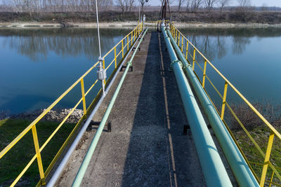 View of storage tank and pipes of chemical industry, italy