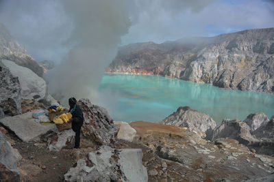 Panoramic view of friends on mountain