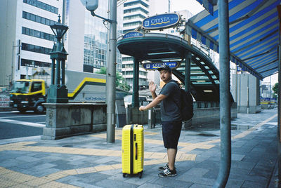 Woman standing in city