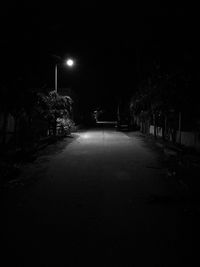 Illuminated street light at night