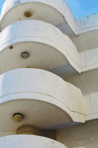 Low angle view of white building against sky