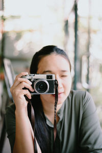 Portrait of man photographing