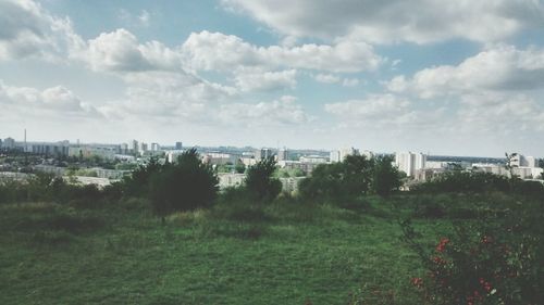 View of buildings against cloudy sky