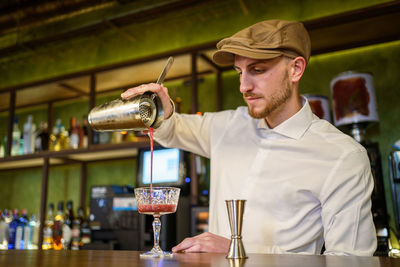 Portrait of man holding wineglass