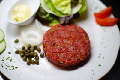 Close-up of served food in plate