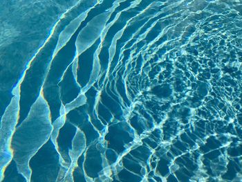 Beautiful light on swimming pool ripples 