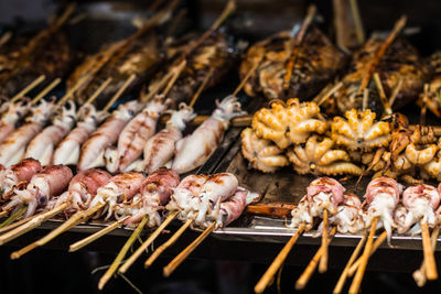 Close-up of meat on barbecue grill