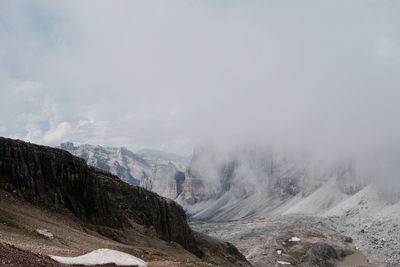 Scenic view of mountains against sky during winter