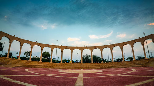 Low angle view of empty bridge against sky