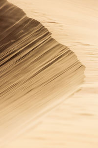 High angle view of sand dunes at beach