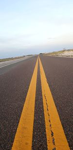 Surface level of road against sky